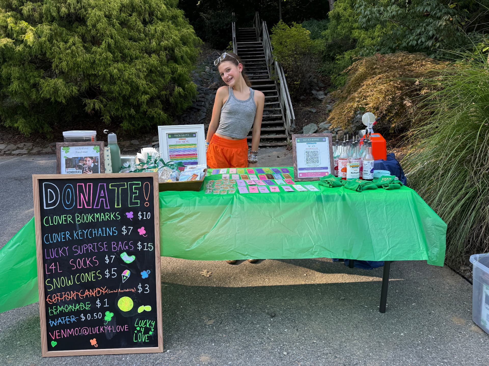 Henley at the Carderock Market Lucky4Love table with bookmarks and keychains