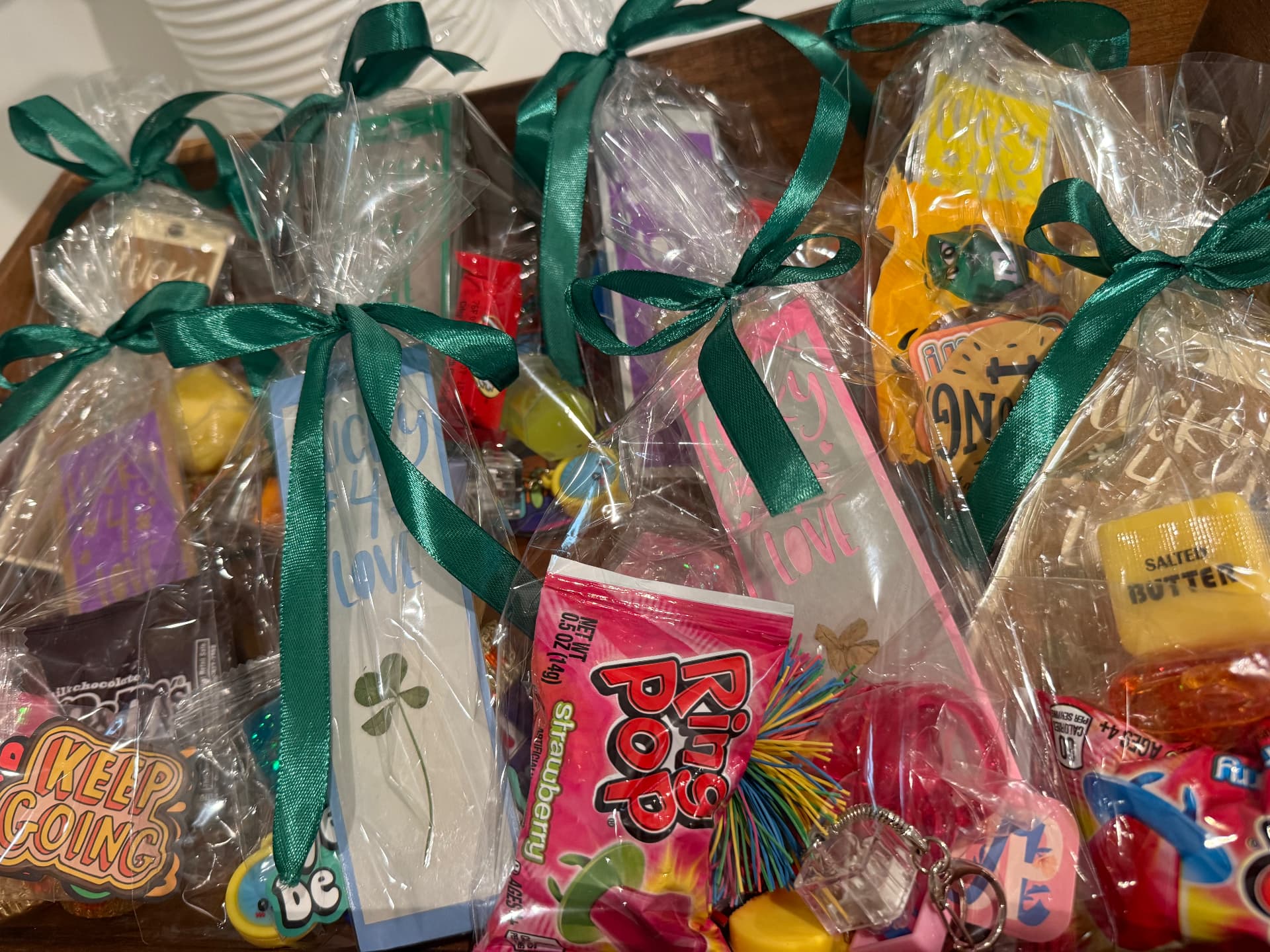 Lucky4Love surprise bags tied with green ribbon and ready to go